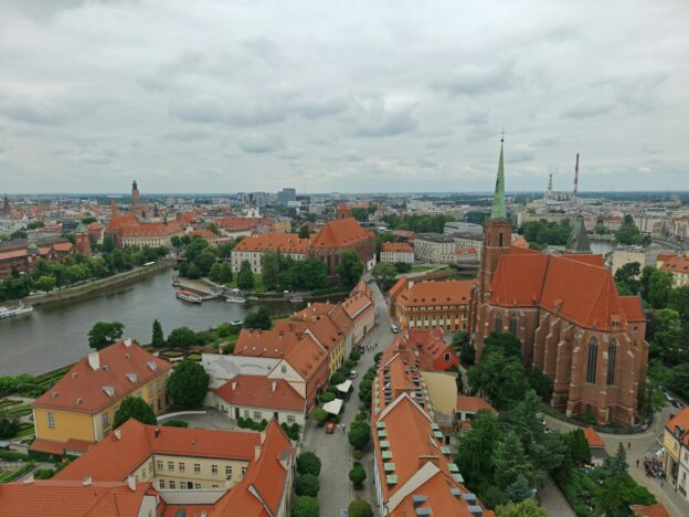 an aerial view of a city with a river running through it